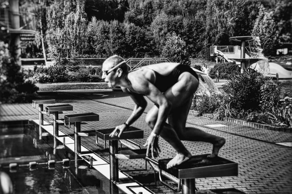 swimmer on block before diving into pool akin to the start of the law school semester